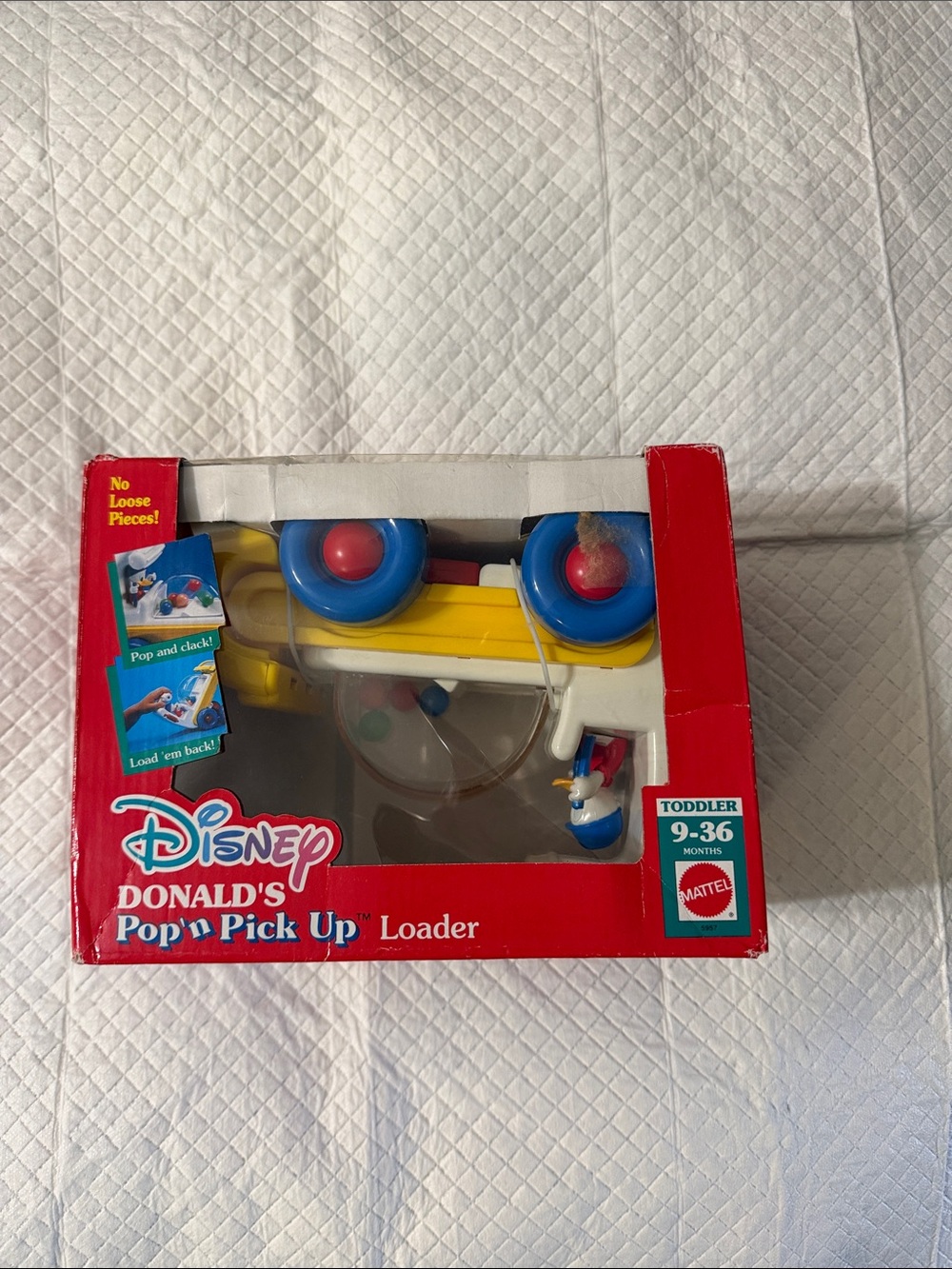 1992 Mattel Disney Donald Pop 'n Pick Up Loader - Yellow, Blue, Red, White